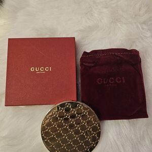 Gucci Gold Compact with Red Velvet Pouch